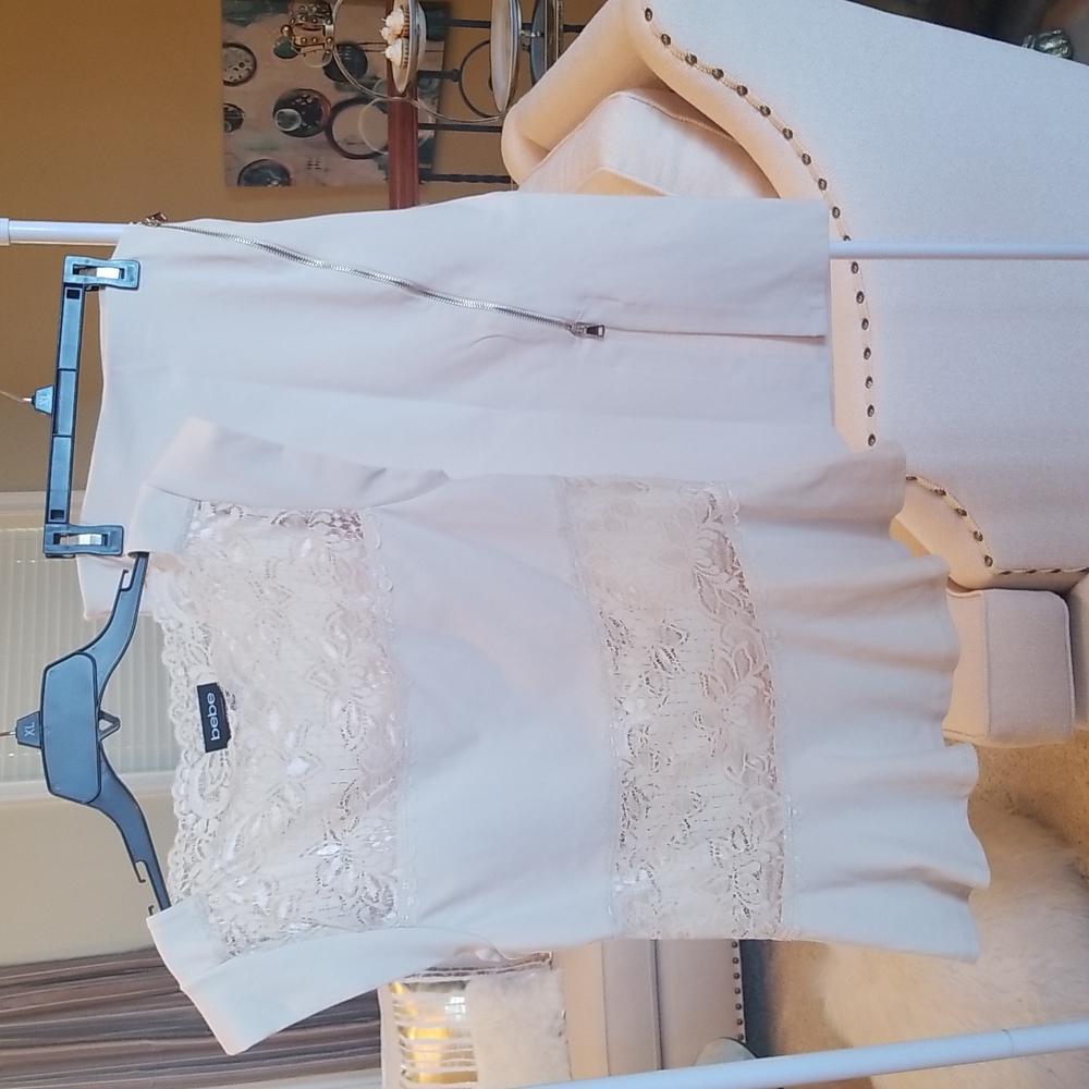 BeBe Cream Lace peek a boo peplum top and zipper slit pencil skirt.